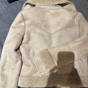 Mother light beige jacket.